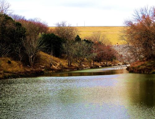 This golden meadow beyond Chalk River reminded me of the pot of gold at the end of a rainbow. -- Photo by Pat Bean