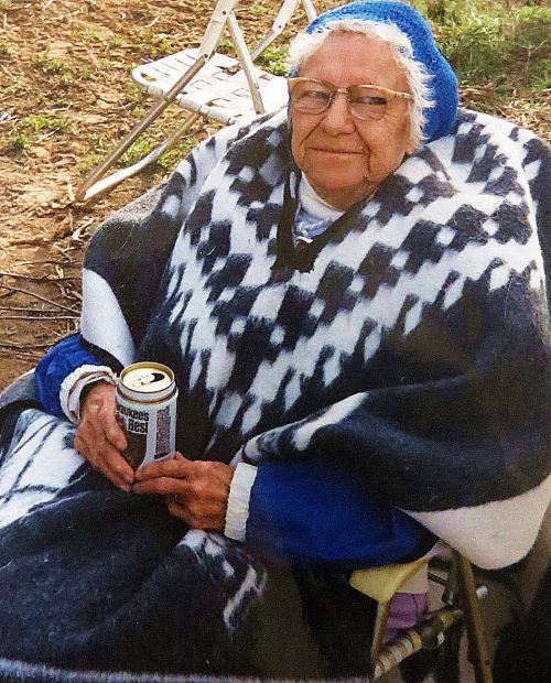 Mother became a Dr. Pepper woman in her later years. She had a beer at 10, 2 and 4 o'clock. This picture was taken a couple of years before she died when I took her on a family camping trip to Zion National Park. She sat around the campfire with us, but then I took her to a nearby motel to spend the night in comfort. I love you, Mom. -- Photo by Pat Bean 
