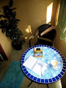 Morning cream-laced coffee, with my journal and a book. The perfect start to any day. -- Photo by Pat Bean 